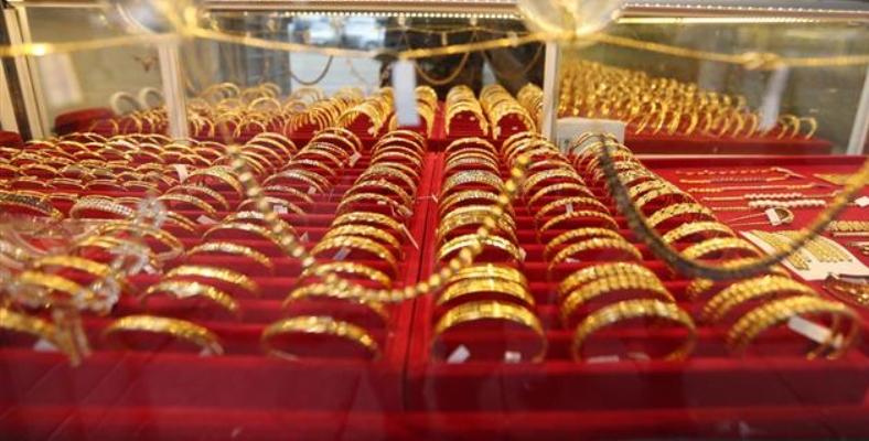 Vàng thế giới tăng lên mức kỷ lục do lo ngại về cuộc chiến thương maị